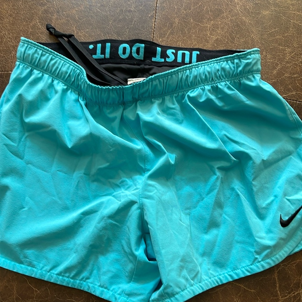 Nike Blue running shirt with built in liner Size S